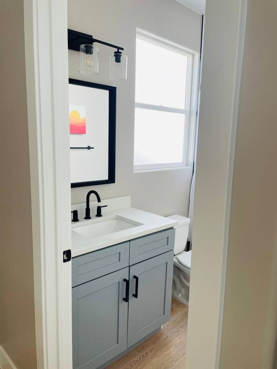 Bathroom off of game room and bunk room with bathtub