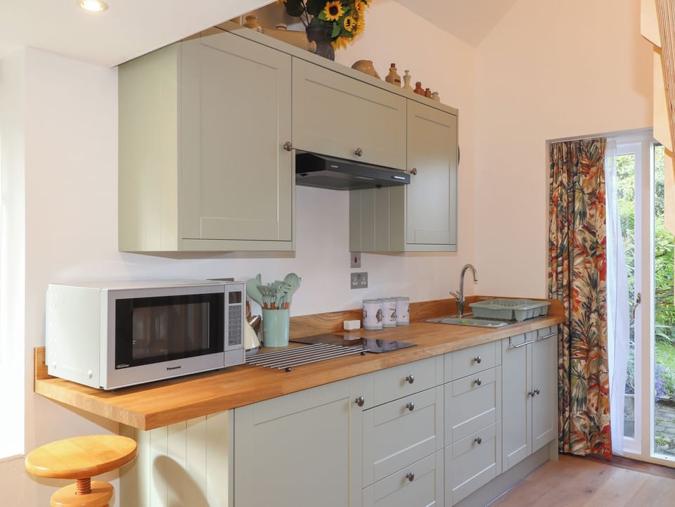 Fridge, electric kettle, toaster, cookware/dishes/utensils