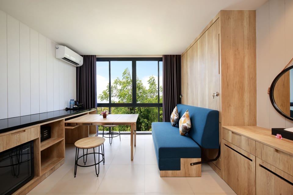 Premium Room, 1 King Bed | Living area | 43-inch Smart TV with digital channels, Netflix, streaming services