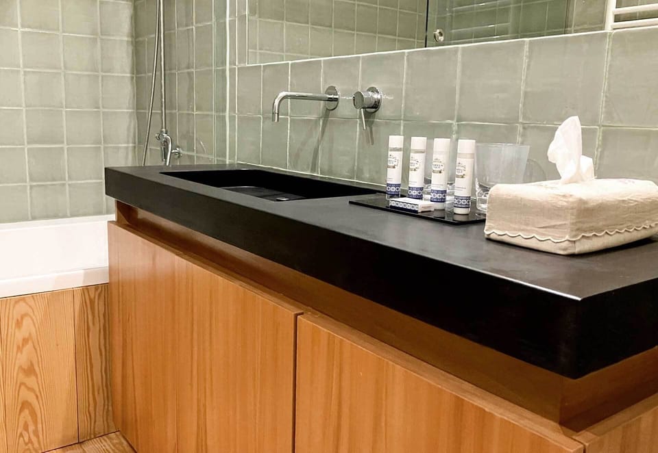 Deluxe Double Room | Bathroom | Designer toiletries, hair dryer, bathrobes, slippers