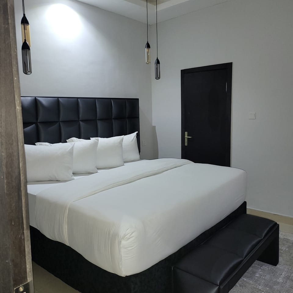 Premium bedding, down comforters, Tempur-Pedic beds, in-room safe
