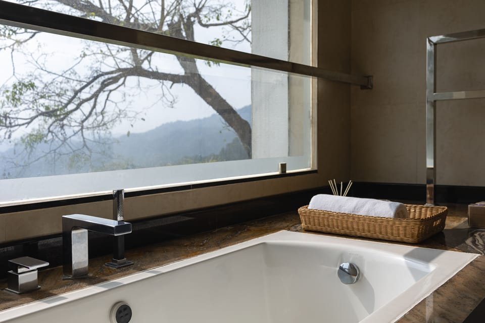 Rainfall showerhead, free toiletries, hair dryer, slippers