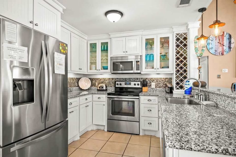 Ffeaturing high-end appliances, ample cabinetry, and plenty of space to prepare your favorite meals.

