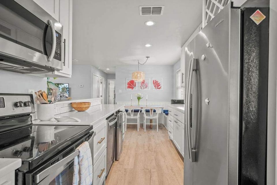 Ffeaturing ample cabinetry and high-end appliances!
