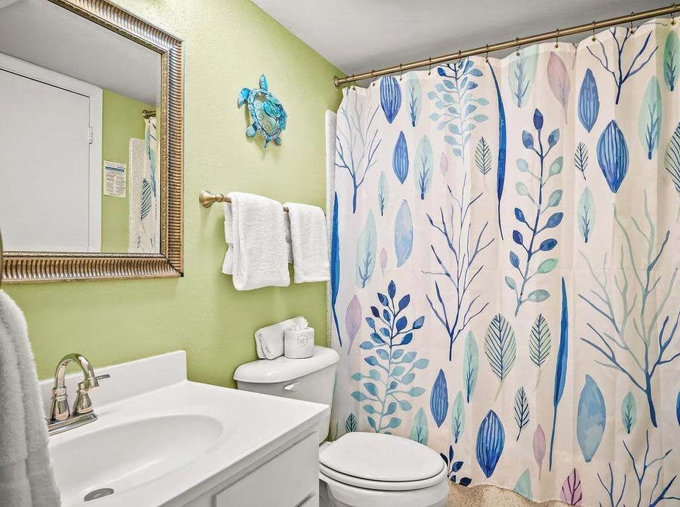Wake up refreshed in our cozy king bedroom, unwind with your favorite shows on the smart TV, and indulge in the luxury of a private ensuite bathroom — your perfect coastal escape awaits.