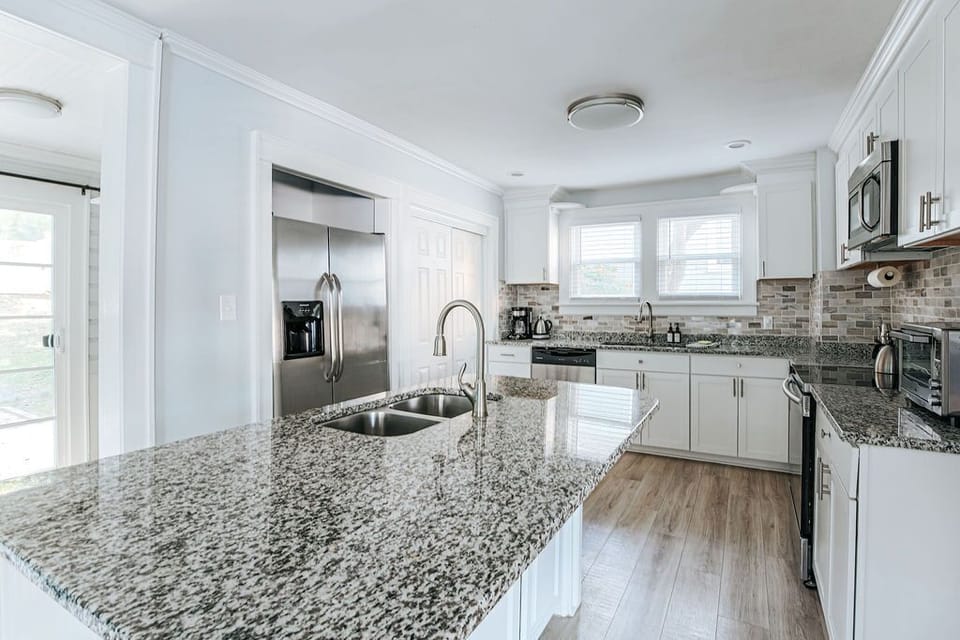 Fully stocked kitchen with everything you need for cooking and dining