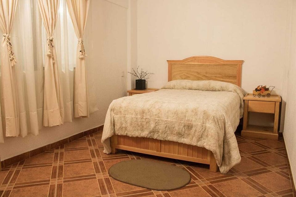 Premium bedding, memory foam beds, blackout drapes, iron/ironing board