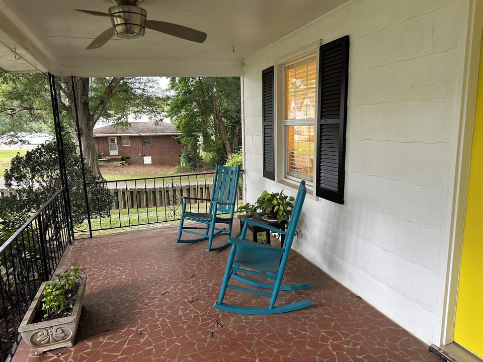Enjoy a cup of coffee or a glass of wine while rocking on the front porch.