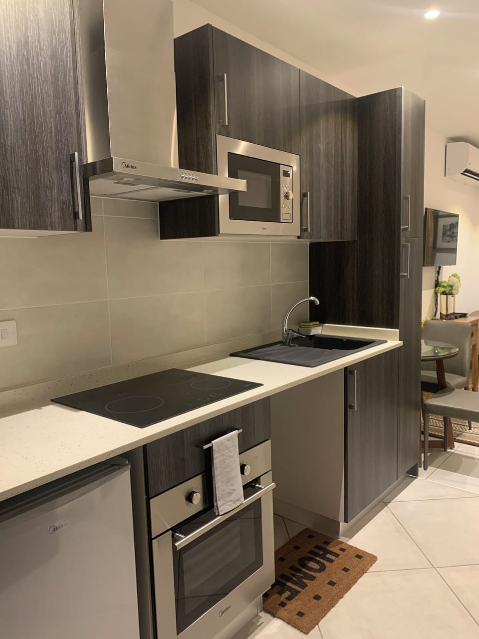 Mini-fridge, microwave, oven, stovetop