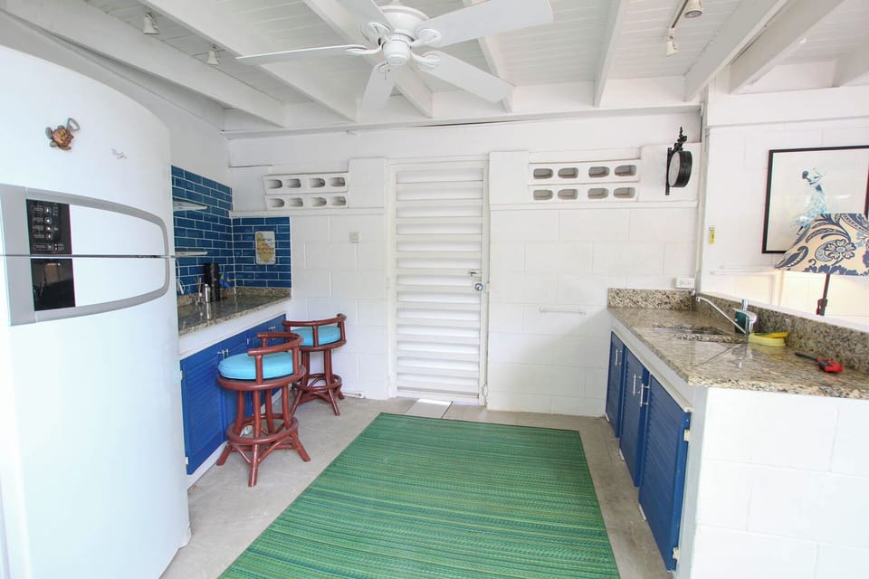 Bar with full size fridge and sink