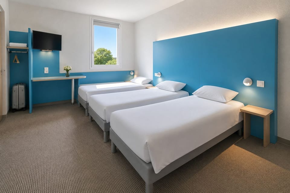 Triple Room | Premium bedding, desk, laptop workspace, blackout drapes