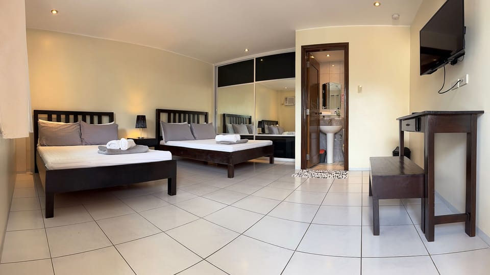 Laptop workspace, iron/ironing board, free WiFi, bed sheets