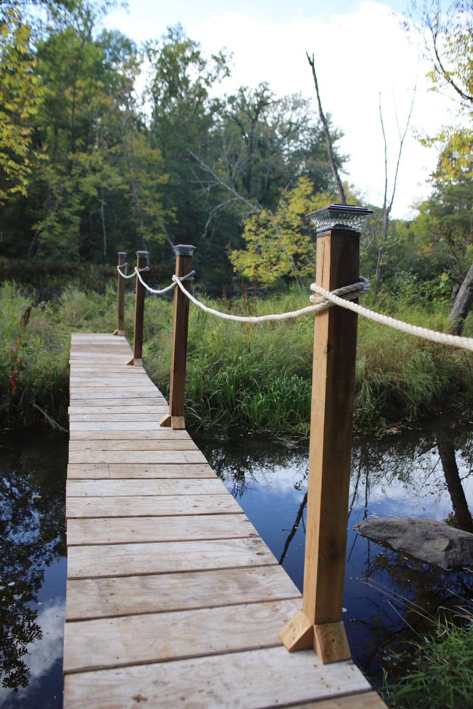 Bridge that crosses small fork in the river.