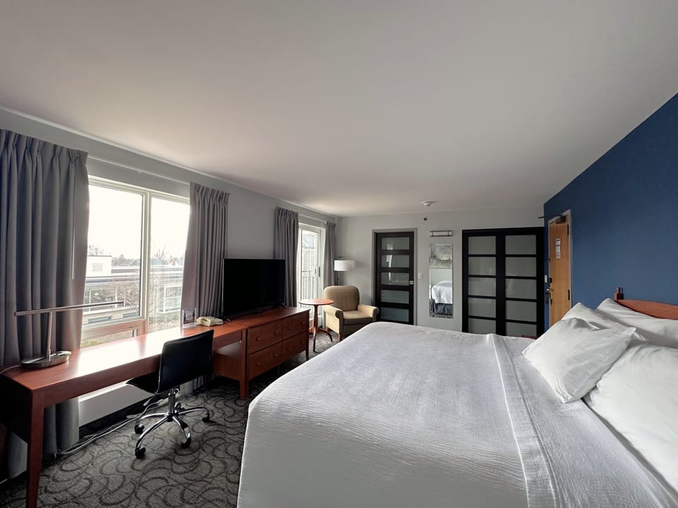Room, 1 King Bed | Desk, blackout drapes, iron/ironing board, free WiFi