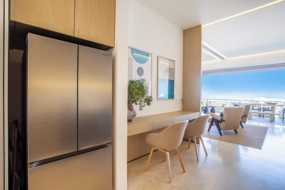 Kitchen amenities include a full-size refrigerator, oven, stove and dishwasher