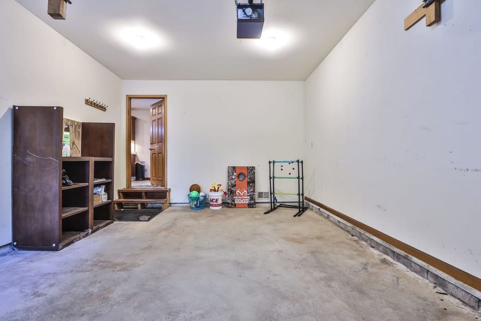 Huge 2 car garage w/ extra yard games