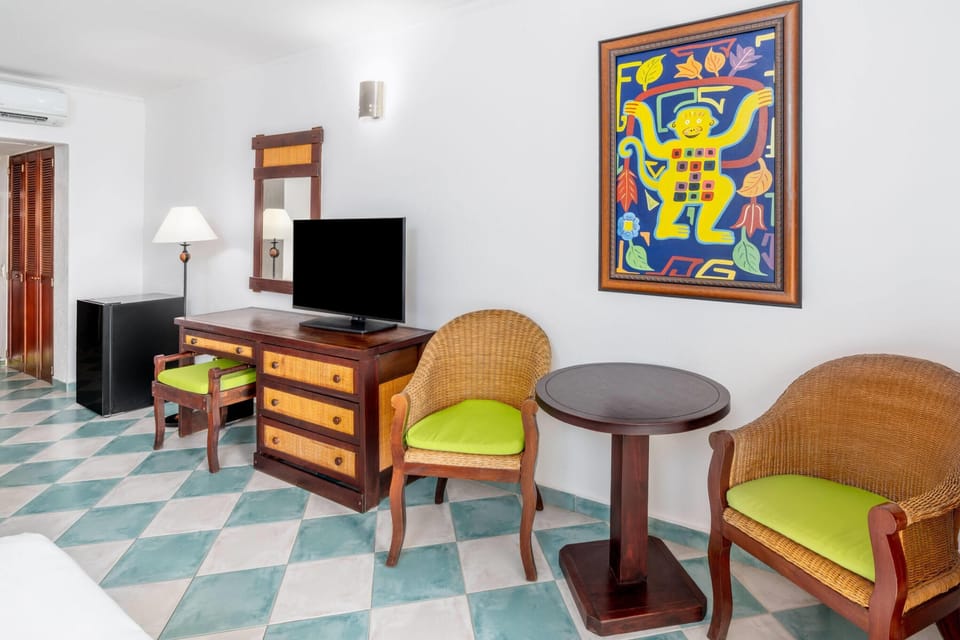 Room, 2 Double Beds, Garden View | Minibar, in-room safe, desk, iron/ironing board