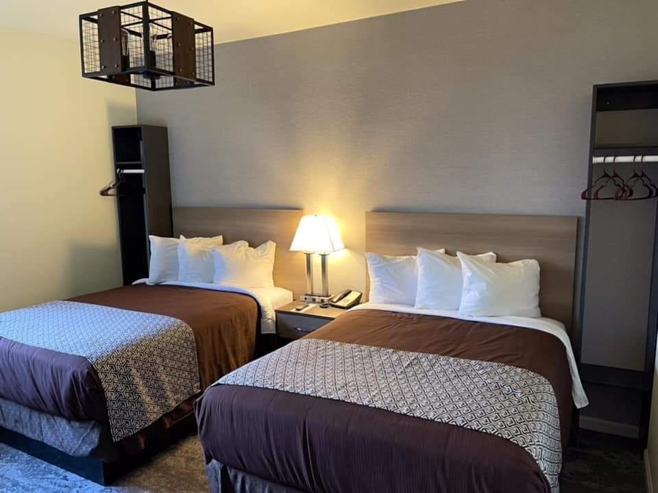 Standard Double Room | Premium bedding, pillowtop beds, blackout drapes, iron/ironing board