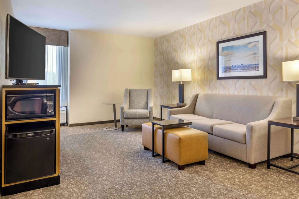 Desk, blackout drapes, iron/ironing board, free cribs/infant beds