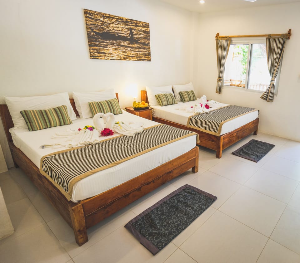 Deluxe AC | In-room safe, bed sheets