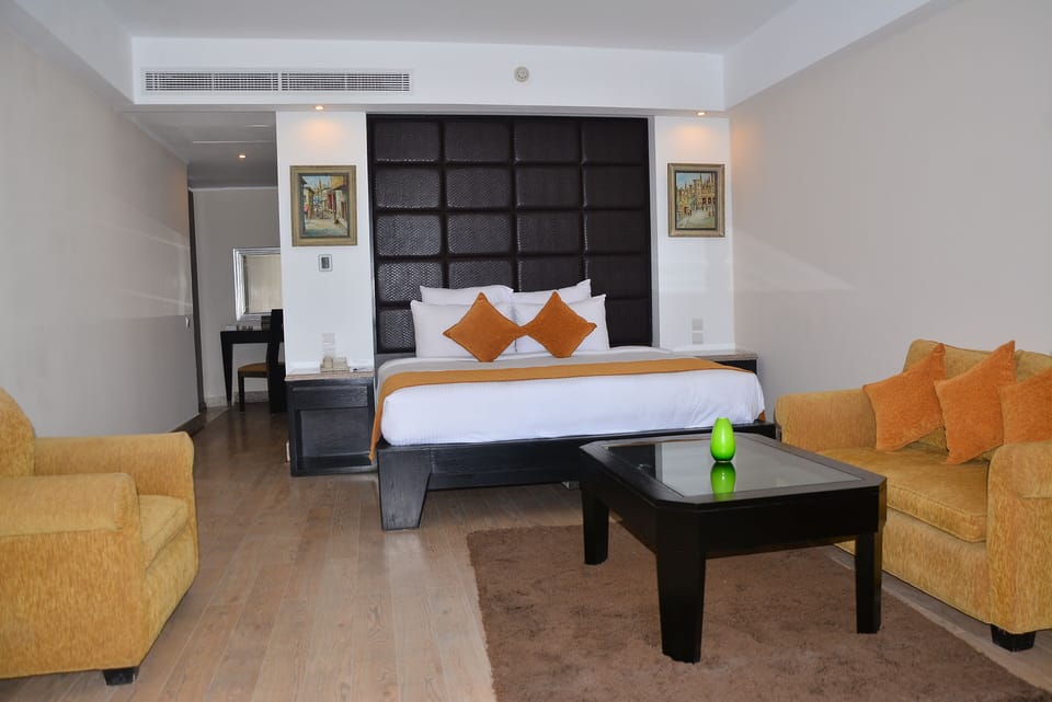 Junior Suite, Beachfront | Free minibar, in-room safe, desk, soundproofing