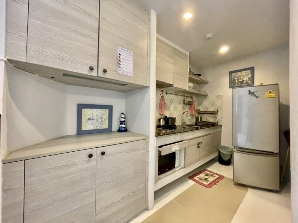 Exclusive Apartment | Private kitchen | Full-size fridge, microwave, stovetop, electric kettle