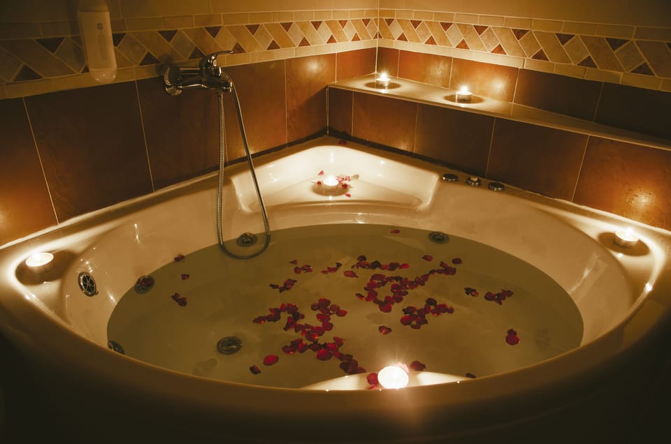 Romantic Double Room, 1 Bedroom, Bathtub | Bathroom amenities | Designer toiletries, hair dryer, towels