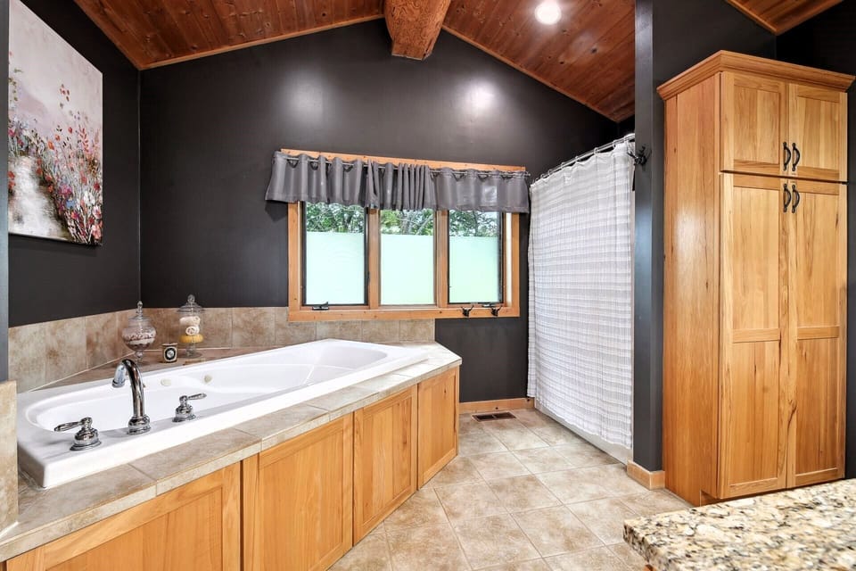 Master bathroom with jetted tub and shower.