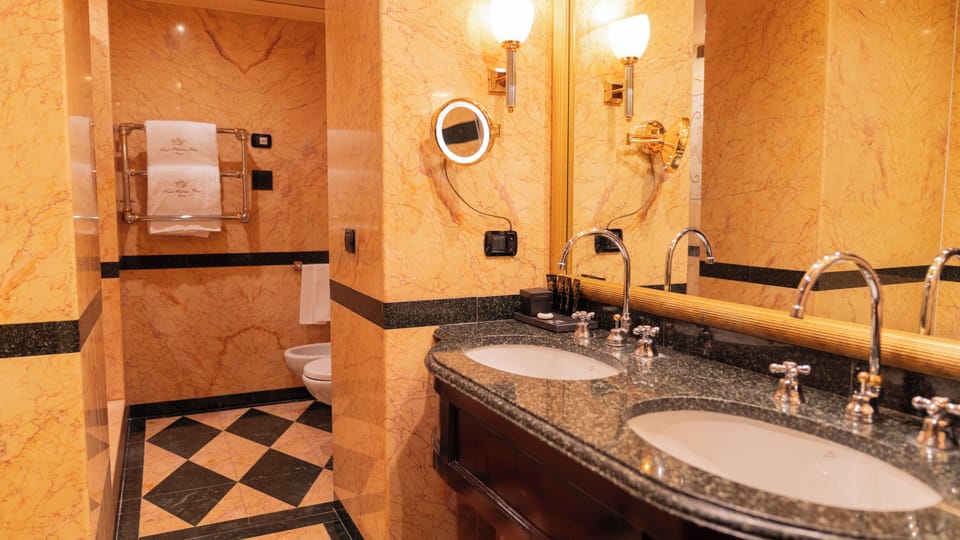 Presidential Suite | Bathroom | Designer toiletries, hair dryer, bidet, towels