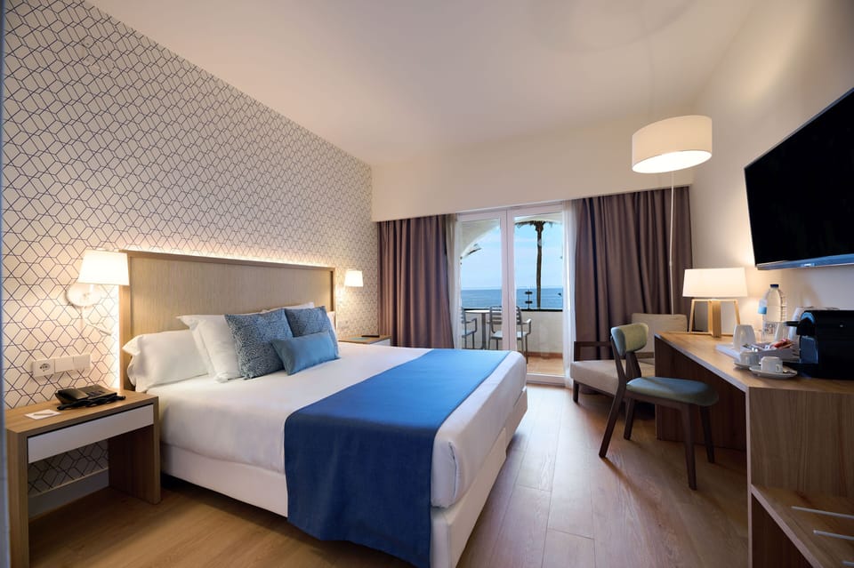 In-room safe, desk, blackout drapes, iron/ironing board (on request)