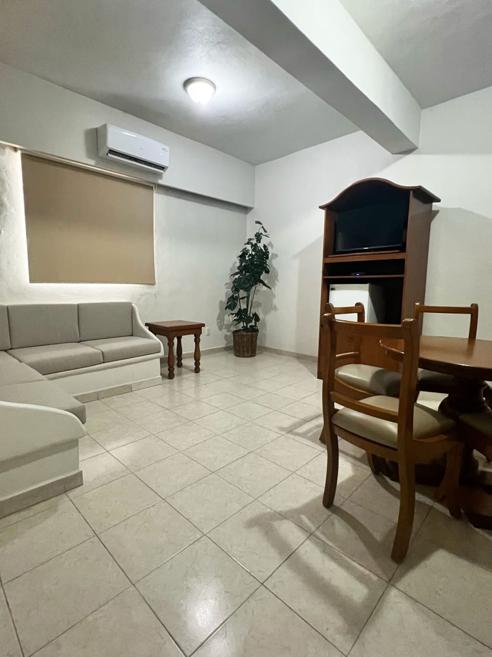 Junior Room, Courtyard View | Living area | LED TV