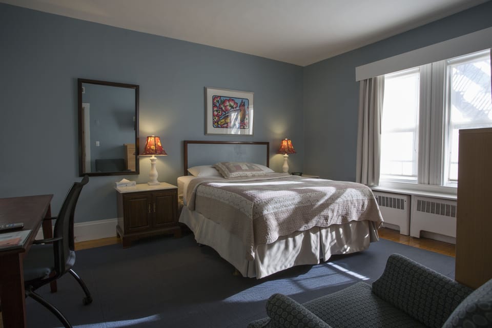 Economy Room, Multiple Beds, Private Bathroom | Desk, iron/ironing board, free WiFi, bed sheets
