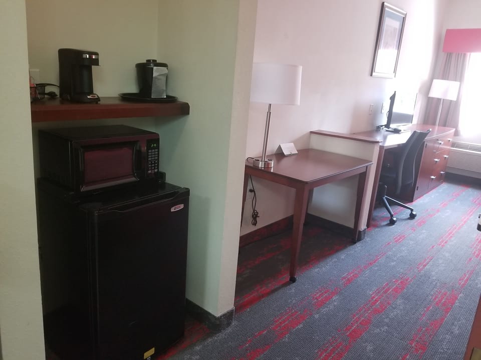 Desk, laptop workspace, blackout drapes, soundproofing