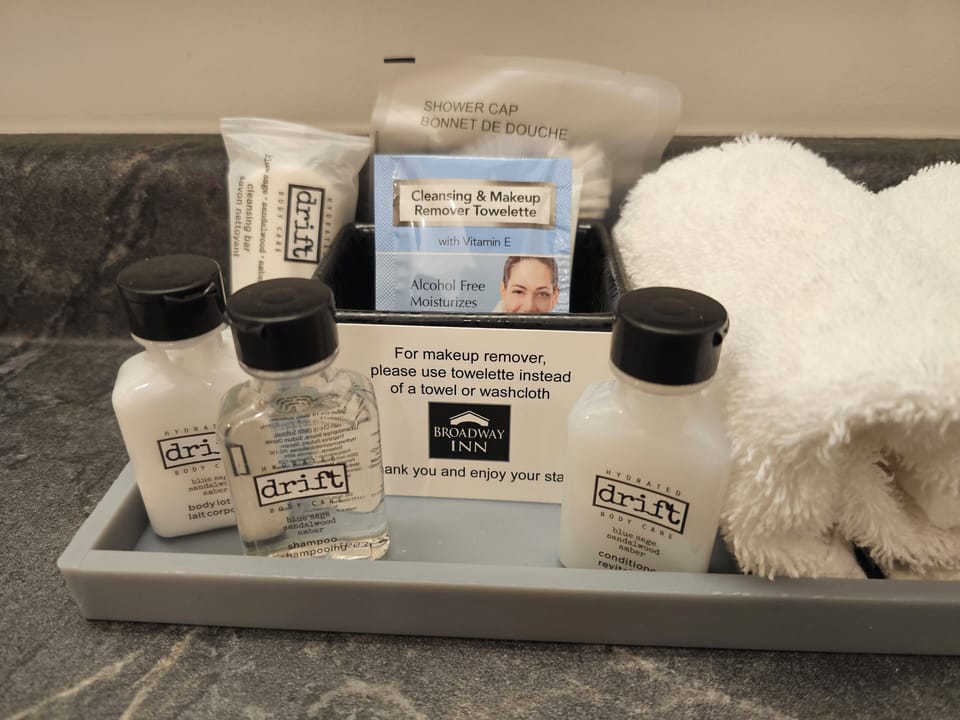 Combined shower/tub, hair dryer, towels, soap