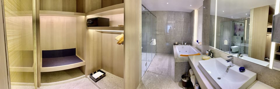 Suite, 1 King Bed, City View (07Vivanta) | Bathroom | Rainfall showerhead, free toiletries, hair dryer, bathrobes