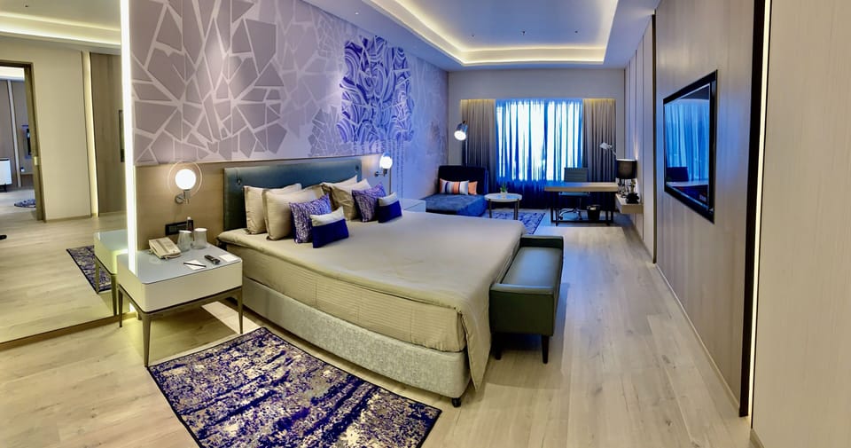 Suite, 1 King Bed, City View (07Vivanta) | Minibar, in-room safe, desk, laptop workspace