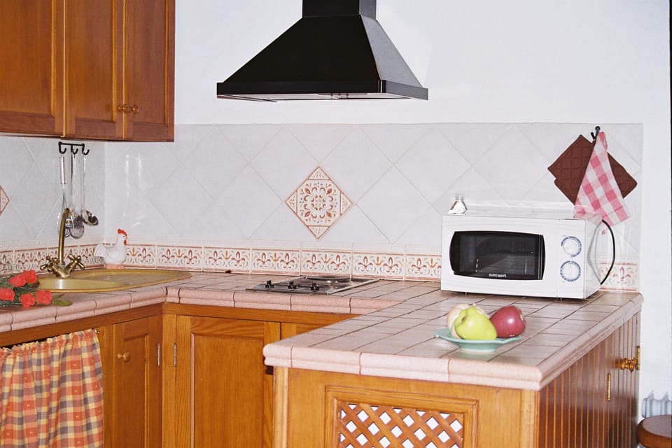 Cottages (Picacho C with 1 double bedroom) | Private kitchen | Full-size fridge, microwave, oven, coffee/tea maker