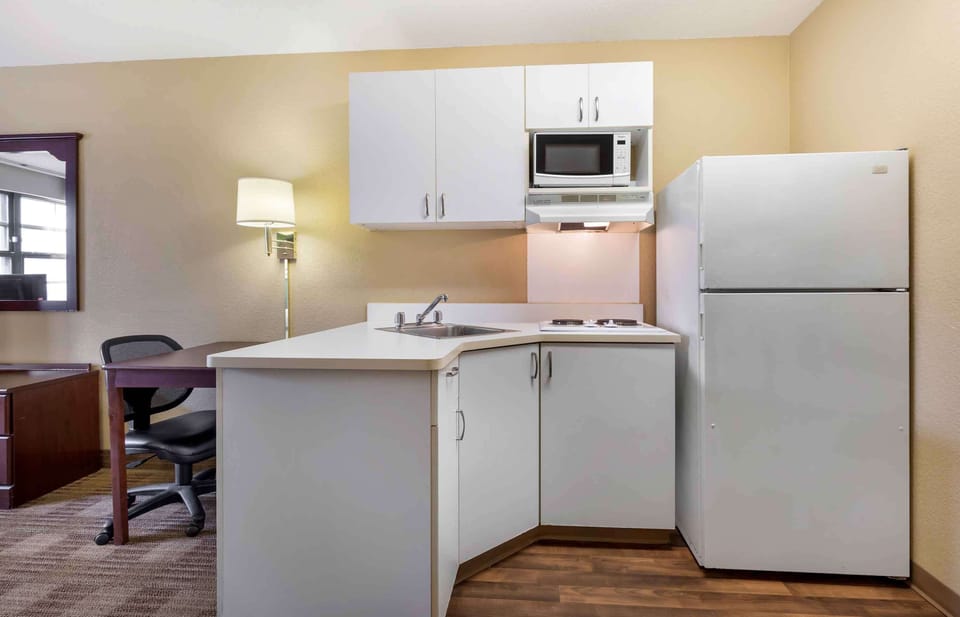 Studio, 1 Queen Bed, Non Smoking | Private kitchen | Full-size fridge, microwave, stovetop, coffee/tea maker