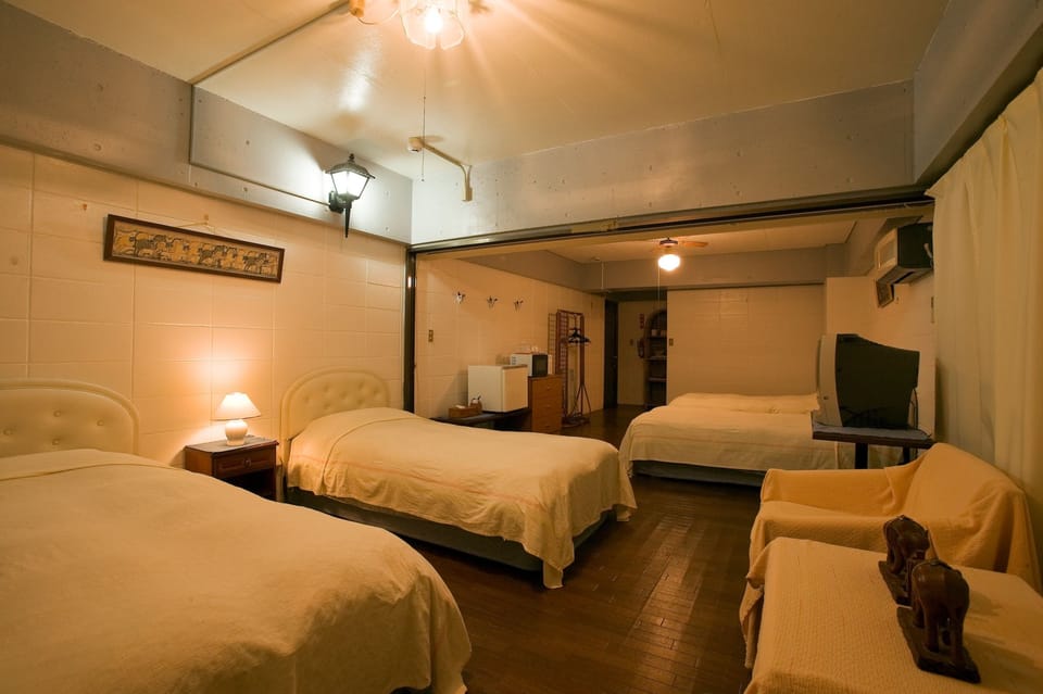 Standard Quadruple Room, Non Smoking, Mountain View | Bed sheets