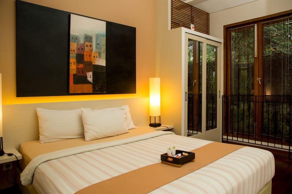 Superior Room | Minibar, in-room safe, desk, iron/ironing board