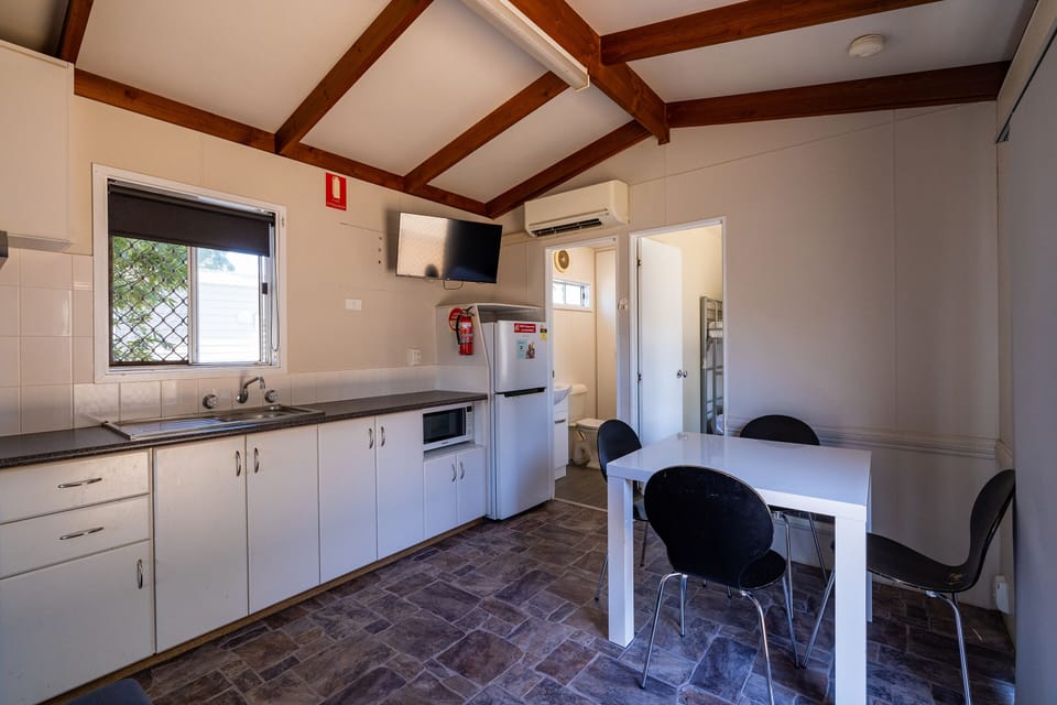 Budget Family Cabin 4 Pax | Private kitchen | Shared fridge, microwave, stovetop, electric kettle