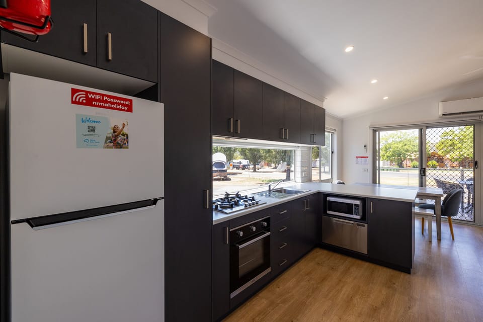 3 Bedroom Cabin | Private kitchen | Shared fridge, microwave, stovetop, electric kettle