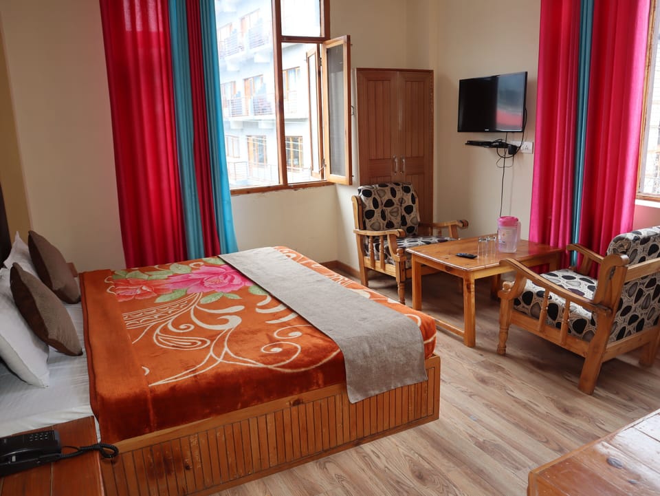 Deluxe Room, Mountain View | Individually furnished, desk, blackout drapes, iron/ironing board