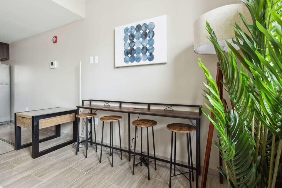 Modern bar‑style table and chairs