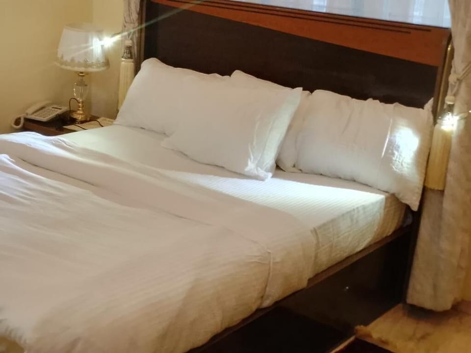 Economy Room | 1 bedroom, in-room safe, free WiFi