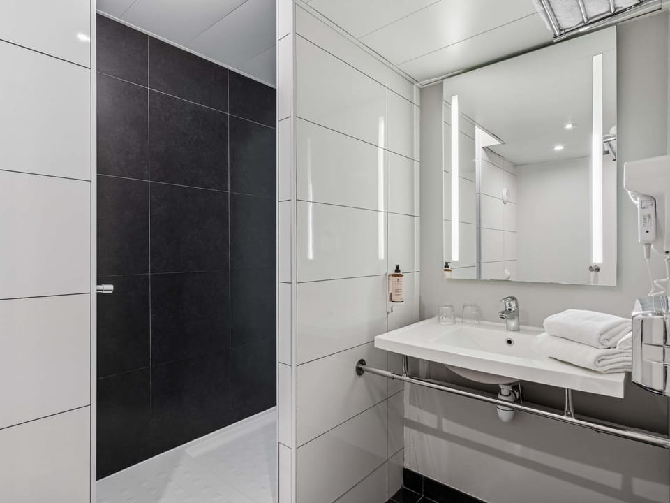 Eco-friendly toiletries, hair dryer, towels, soap