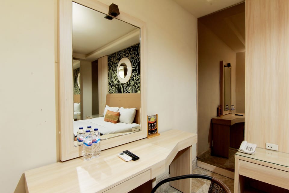 Deluxe Room | Premium bedding, in-room safe, desk, soundproofing
