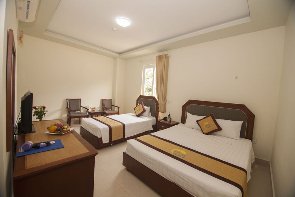 Standard Triple Room | Minibar, desk, blackout drapes, free WiFi