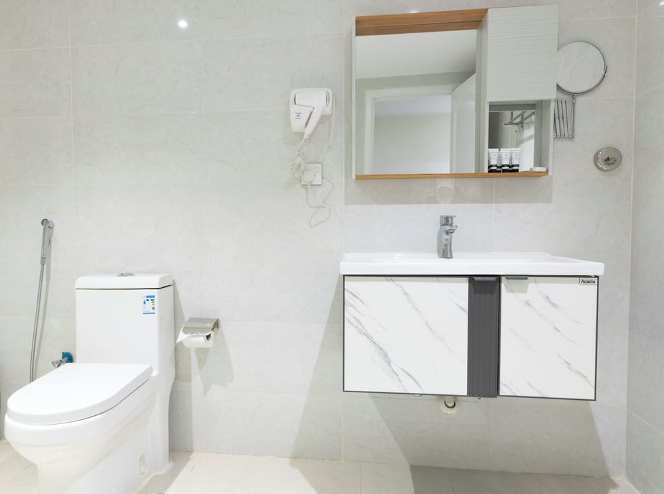 Shower, rainfall showerhead, designer toiletries, hair dryer