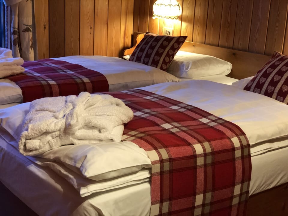 Premium bedding, down comforters, in-room safe, blackout drapes